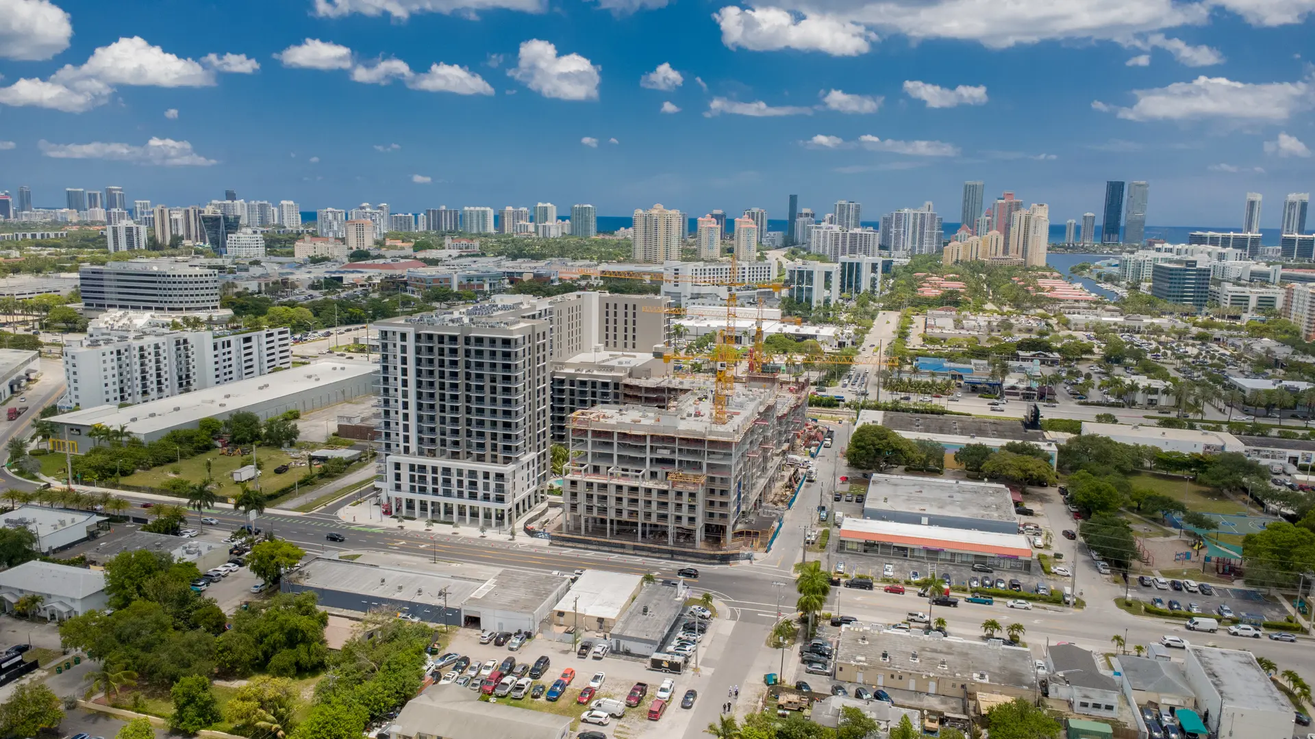 Aerial view of a South Florida urban district under clear skies